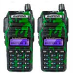 Two Baofeng dual-band FM transceivers with green camouflage, each showing a purple LCD display and keypad.