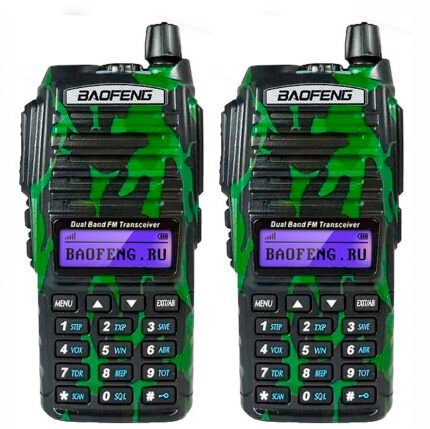 Two Baofeng dual-band FM transceivers with green camouflage, each showing a purple LCD display and keypad.