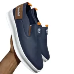 Slip-ons homme à semelle blanche