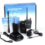 Baofeng two-way radio kit with handheld radio, two antennas, charger, belt clip, power adapter, manuals, and blue box.